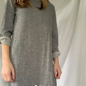 Elbow length shirt dress, button on the sleeves, zipper on one shoulder